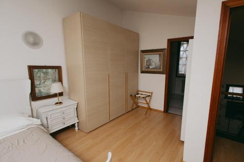Postel nebo postele na pokoji v ubytování Enzo’s House