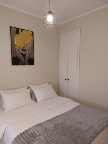 Postel nebo postele na pokoji v ubytování Joel Apartment Alexandroupoli