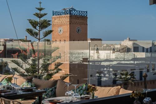 a view of a building with a clock tower at Le Palazzo in Essaouira