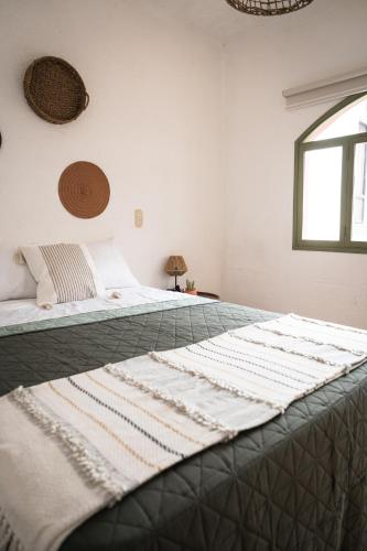 Ένα ή περισσότερα κρεβάτια σε δωμάτιο στο Central Hostel Pondicherry