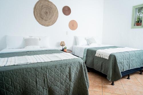 Postel nebo postele na pokoji v ubytování Central Hostel Pondicherry