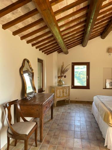 Katil atau katil-katil dalam bilik di Al Poggio dei 4 Borghi