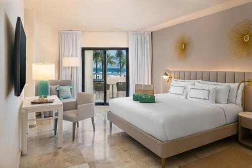 Postel nebo postele na pokoji v ubytování Melia Casa Maya Cancun All Inclusive
