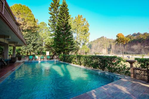 Bazén v ubytování River Access Resorts by Bel-La Monde - "A Unit of Luxe Opera Hotels & Resorts", Dhikhuli Jim Corbett, Uttarakhand nebo v jeho okolí