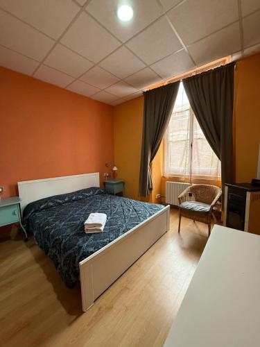 Postel nebo postele na pokoji v ubytování Andres Guest House Sanremo