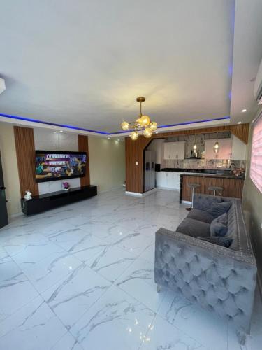 TV a/nebo společenská místnost v ubytování Apartamento 2