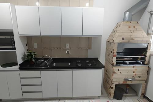 Η κουζίνα ή μικρή κουζίνα στο 100m PRAIA Central Barra Velha