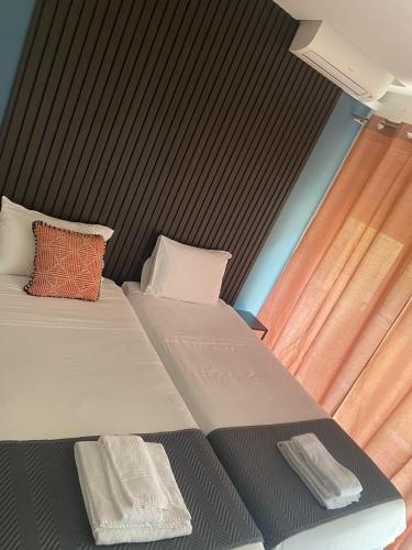 Ένα ή περισσότερα κρεβάτια σε δωμάτιο στο Marinha Garden Inn - AL