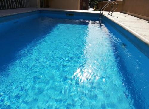 Het zwembad bij of vlak bij Carriles Inn