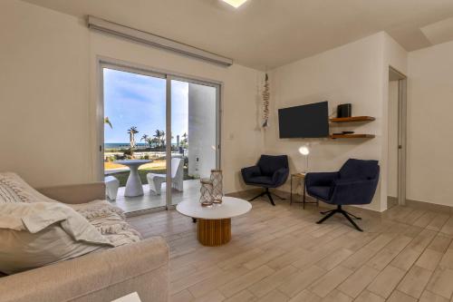 Una televisión o centro de entretenimiento en Residences by Playa Caracol Residences