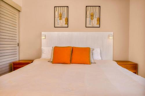 Cama o camas de una habitación en Residences by Playa Caracol Residences