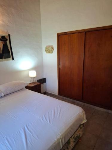 Postel nebo postele na pokoji v ubytování Caluca Ranch 2