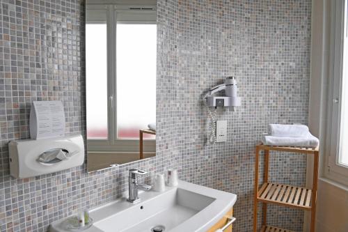 Koupelna v ubytování Cit'Hotel La Villa Julia