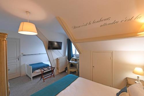 Postel nebo postele na pokoji v ubytování Cit'Hotel La Villa Julia