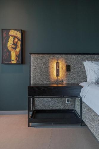 Кровать или кровати в номере Gorges Residence Salvador
