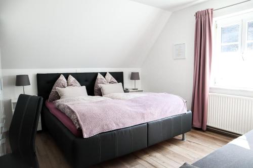 Postel nebo postele na pokoji v ubytování Appartements Setzbergblick