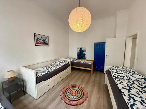 Ένα ή περισσότερα κρεβάτια σε δωμάτιο στο Wu Flats