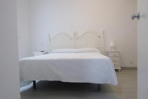 Postel nebo postele na pokoji v ubytování Hostal Andalucia