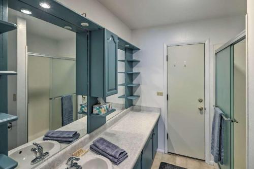 a bathroom with two sinks and a large mirror at Lakeview- Pool & Spa-Pet friendly- Boat parking in Lake Havasu City