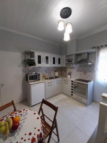 Cuisine ou kitchenette dans l'établissement Folini House