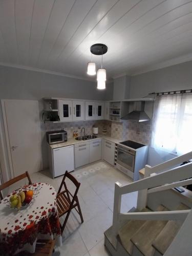 Cuisine ou kitchenette dans l'établissement Folini House