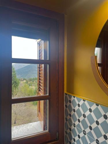 Φωτογραφία από το άλμπουμ του Secret Mountain Cabin "Θεοδόξαρο" σε Elatóvrisi
