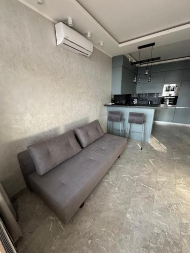 Зона вітальні в Arcadia apartment & sea terrace