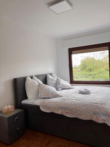 Katil atau katil-katil dalam bilik di Schöne Wohnung am Dümmersee