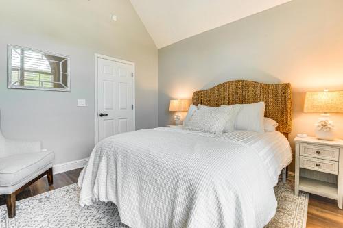 a bedroom with a bed and a chair and a window at Outdoor Entertainment Area Sharpsburg Home! in Peachtree City
