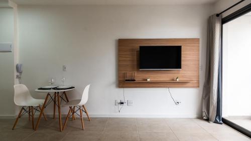 TV a/nebo společenská místnost v ubytování Alto Madalena - Studios de luxo com piscina panorâmica