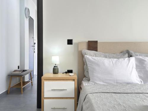 Ένα ή περισσότερα κρεβάτια σε δωμάτιο στο Kilada Luxury Apartment 2