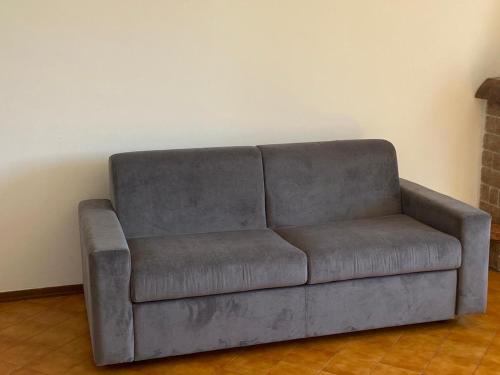 Ein Sitzbereich in der Unterkunft Delizioso appartamento sul lago - Casa Marina