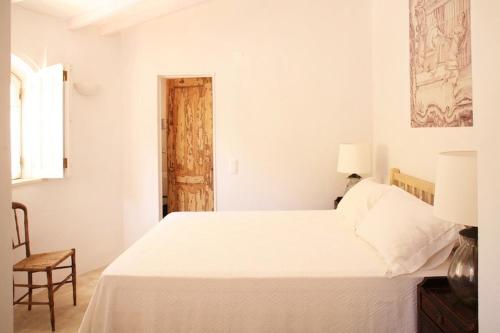 Postel nebo postele na pokoji v ubytování Casa Burra