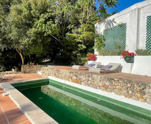 Bazén v ubytování Casa Burra nebo v jeho okolí