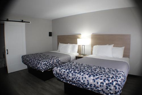 Кровать или кровати в номере Riviera Motor Inn