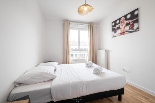 Ένα ή περισσότερα κρεβάτια σε δωμάτιο στο Disneyland-Paris, 6 pers, Parking, Wifi