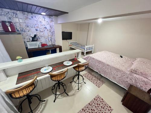 Ένα ή περισσότερα κρεβάτια σε δωμάτιο στο Loft oceano 01