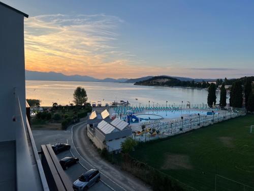 a view of a large body of water with a pool at Yves Lake Front Apartments in Ohrid