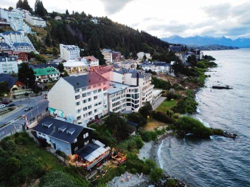 an aerial view of a city next to the water at Departamento a Orilla del Lago in San Carlos de Bariloche