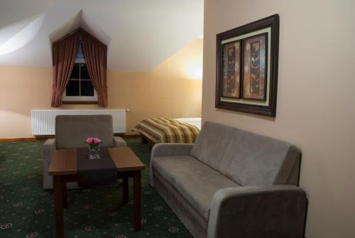 Χώρος καθιστικού στο Hotel Dwór Galicja