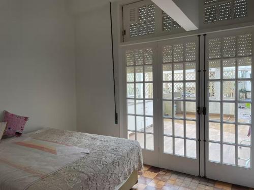 Katil atau katil-katil dalam bilik di Lofts de luxo no Palácio Quitandinha