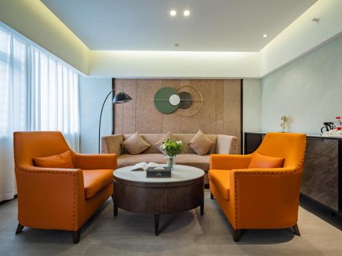 Coin salon dans l'établissement Taitong Hotel