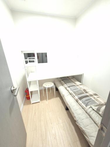 Ένα ή περισσότερα κρεβάτια σε δωμάτιο στο All Stay Hostel
