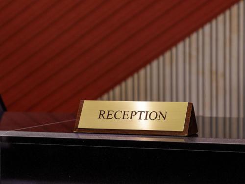 a sign that says rejection sitting on top of a table at Nishitetsu Inn Kokura in Kitakyushu