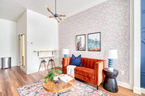 a living room with a couch and a table at Stay Portland - Bright Brooklyn Studio in Portland
