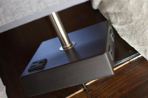 a close up of a metal box on the floor at 期間限定連泊割-新幹線徒歩15分-空港車8分-田んぼに囲まれて暮らす自然に寄り添う静かな一棟貸切宿 in Hanamaki