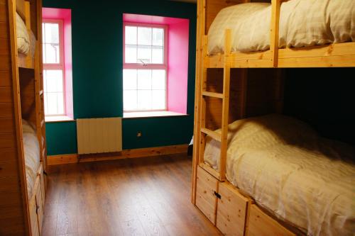 Ένα ή περισσότερα κρεβάτια σε δωμάτιο στο The Black Sheep Hostel