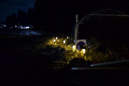 a group of lights in a field at night at 期間限定連泊割-新幹線徒歩15分-空港車8分-田んぼに囲まれて暮らす自然に寄り添う静かな一棟貸切宿 in Hanamaki