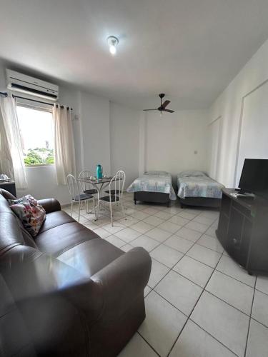 Μια τηλεόραση ή/και κέντρο ψυχαγωγίας στο Apartamento mobiliado - Centro Cuiabá
