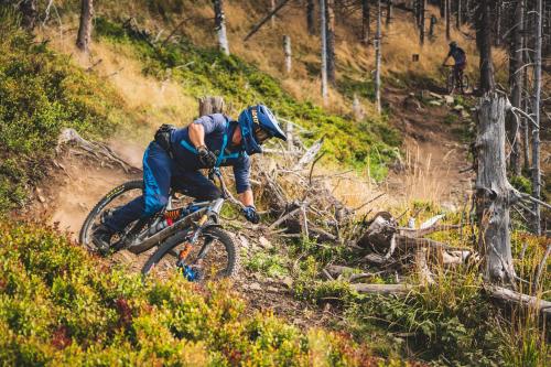 a man riding a mountain bike down a hill at XYZ eXtreme You Zen in Szczyrk